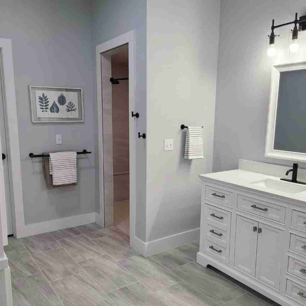 Luxury modern bathroom remodel by Paul Jay Construction featuring custom tile work, contemporary fixtures, and coastal design in Fairhope, Baldwin County AL